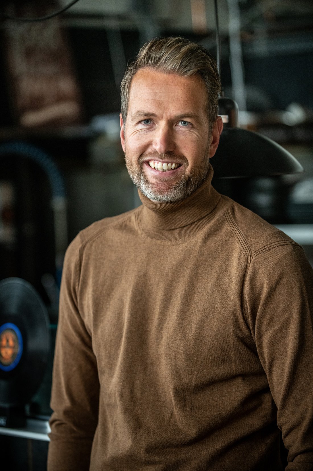 40 year old male smiling at the camera